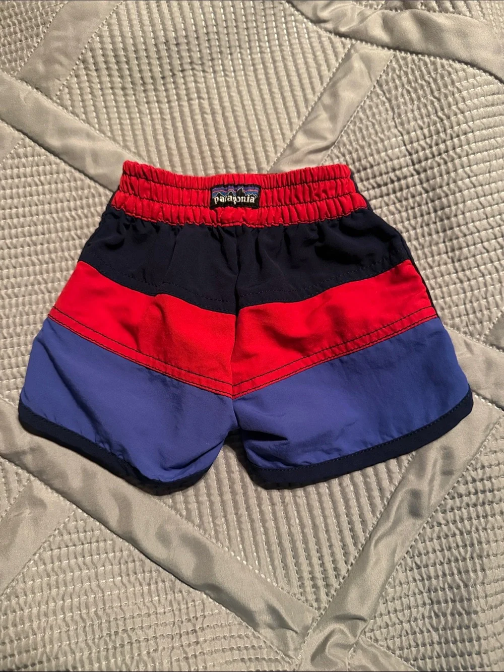 Patagonia Kids Colorblock Board Shorts in Red, Navy & Periwinkle